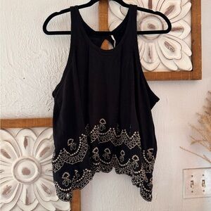 Free People black tank top. Open back. Cream embroidery. Size small